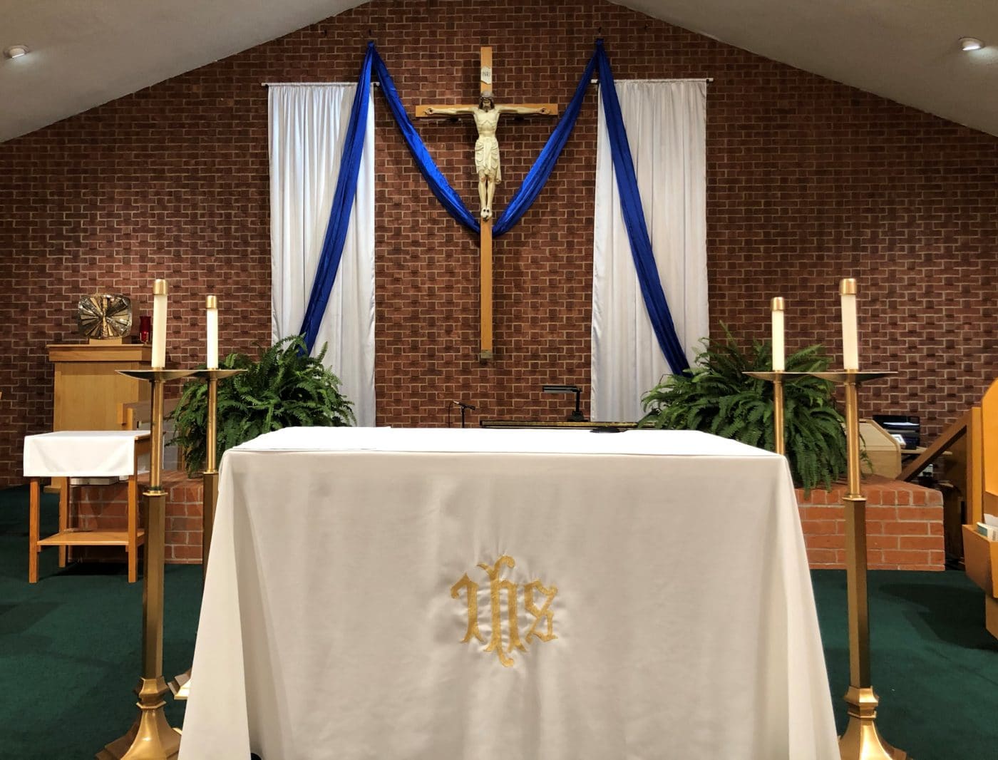 Sanctuary decorated for Marian feast.